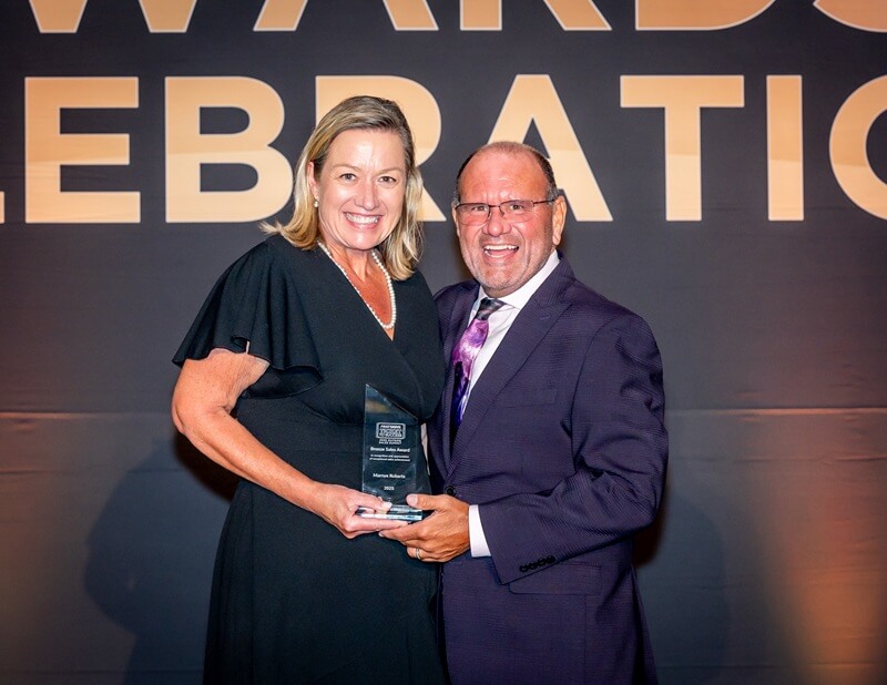 An image of Marnye accepting her award.